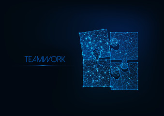 Wall Mural - teamwork concept with four glowing low poly jigsaw puzzle pieces on dark blue background.