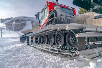 Snow grooming machine in Park City Utah ski resort