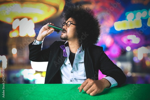 Fotomural Stress gambler man drinking alcohol in the casino