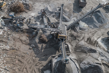 Aerial view of crushed stone quarry machine in a construction material factory 