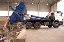 Truck Dumps Waste To The Incinerator, Grab Take The Rubbish