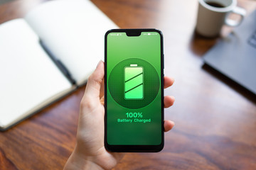 Mobile phone battery full charged indicator icon on screen.