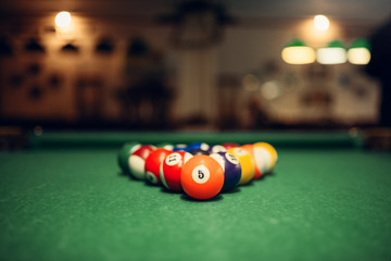 Billiard balls on green table, american pool