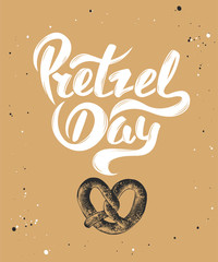 Wall Mural - Vector card with hand drawn unique typography design element for greeting cards, decoration, prints and posters. Pretzel day with sketch of baked pretzel. Handwritten funny slogan lettering.