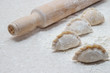 © Денис Тетеря - Appetizing dumplings, vareniki, ravioli, momo close-up. Boiled dough with filling. Traditional dish of Ukraine, Italy, Asia. Dumplings with meat, fish, vegetables. A hearty breakfast, lunch, dinner.