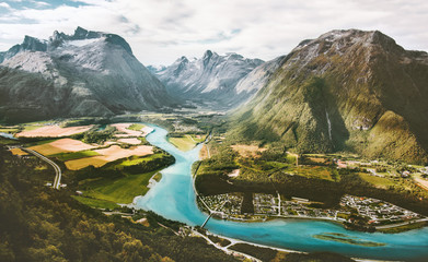 Romsdal Mountains valley and river landscape aerial view in Norway Travel scenery nature Andalsnes Romsdalseggen viewpoint summer season