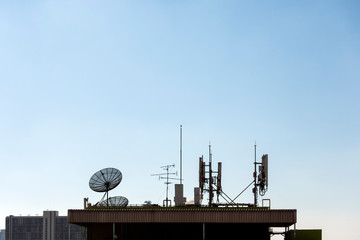 Group of telecomunication antenna and satellite dish