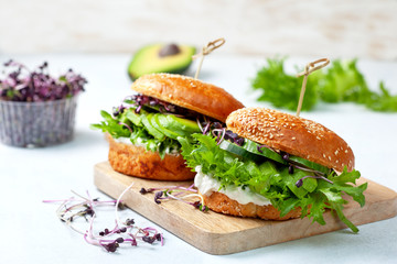 green burger with avocado