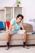 © Elnur - Young man husband ironing at home