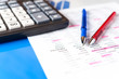 © Ded Pixto - Business and financial background with data, pen and calculator. Bookkeeping background.