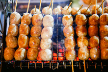 Isaan Sausage Being Grilled On The Traditional Stove That Be A Part Of Street Food In Thailand