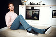 © Andrey Kiselev - young man at home