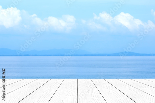 Empty White Marble Table Over Blur Blue Sea And Sky In Summer