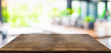 Empty Perspective Hard Wood Table And Blurred Garden Cafe Light Background. Product Display Template.Business Presentation.