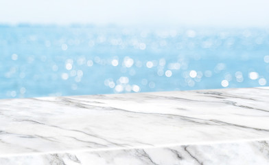 Aufkleber - Empty glossy white marble table top with blur sky and sea boekh background,banner mock up template for display of product.