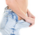 © OceanProd - young woman in oversized shorts after a diet sport