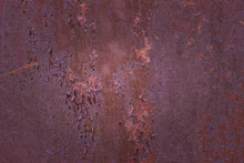 Old Rusted Sheet Of Metal With Partially Peeling Paint And Exciting Patterns Close-up