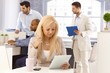 © nyul - Businesswoman using tablet