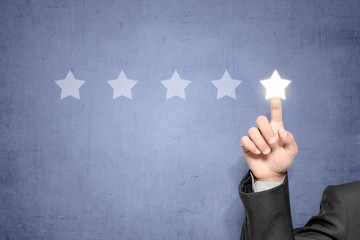 business fingers choosing bright stars on virtual screen