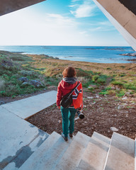 Poster - Andoya island sea coast and tourist with norwegian flag