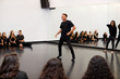 © Monkey Business - Male Student At Performing Arts School Performs Street Dance For Class And Teacher In Dance Studio