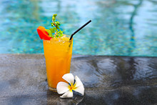 Cocktail Mai Tai With Light Rum, Dark Rum, Orange Curacao, Almond Syrup, Lime, Ice Cubes, Pineapple And Mint By The Pool