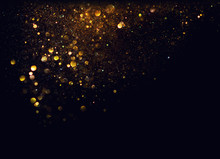 Glitter Vintage Lights Background. Gold And Black. De Focused