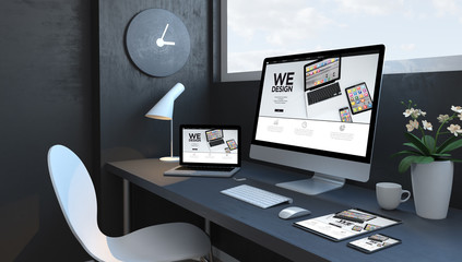 navy blue workspace with responsive devices design website