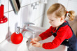 © Irina Schmidt - Cute little toddler girl washing hands with soap and water in bathroom. Adorable child learning cleaning body parts. Morning hygiene routine. Happy healthy kid at home or nursery.