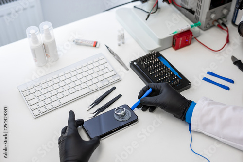 Top View Of Well Organized It Service Desk With Tools And Engineer