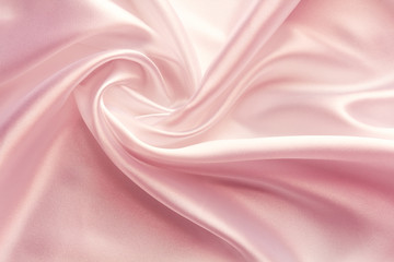 Wall Mural - light pink satin fabric with large folds, delicate background