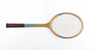 © serikbaib - vintage wooden tennis racket on a white background