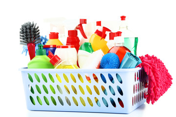 Wall Mural - Bottles with detergent and cleaning tools on white background