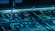 © Gorodenkoff - Factory Machinery at Work: Printed Circuit Board Being Assembled with Automated Robotic Arm, Pick and Place Technology Mounts Microchips to the Motherboard. Macro Close-up.