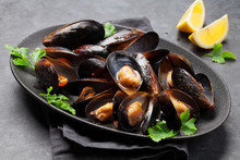Delicious Mussels With Tomato Sauce And Parsley