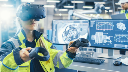 Poster - Factory: Female Industrial Engineer Wearing Virtual Reality Headset and Holding Controllers, She Uses VR technology for Industrial Design, Development and Prototyping in CAD Software.