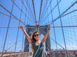 Happy Girl at the Brooklyn Bridge, New York