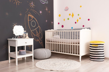 Poster - Stylish baby room interior with comfortable bed