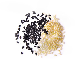 Wall Mural - white sesame and black sesame seeds on white background