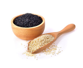 white sesame and black sesame seeds on white background