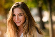 © Martinan - Attractive smiling girl with long shiny hair