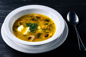 Sticker - mushroom soup in a cafe, lunch menu on a dark table