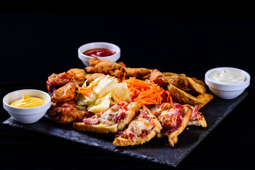 Poster - hot sandwiches on a dark background, set of snacks