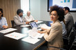 © NDABCREATIVITY - Business colleagues in conference meeting room presentation