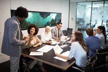 Business colleagues in conference meeting room presentation