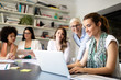 © NDABCREATIVITY - Group of successful business people at work in office