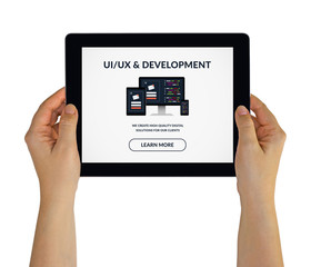 Wall Mural - hands holding tablet with ui/ux design and development concept on screen