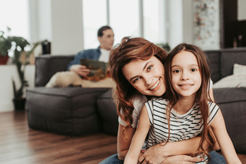 Happy mother and daughter having fun together