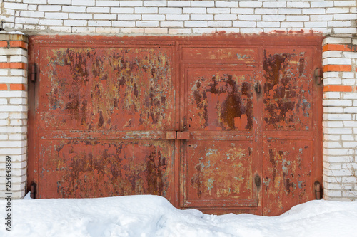 Closed Iron Garage Door With Rust Marks Buy This Stock Photo And