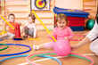 © Oksana Kuzmina - Happy sporty children play in nursery gym